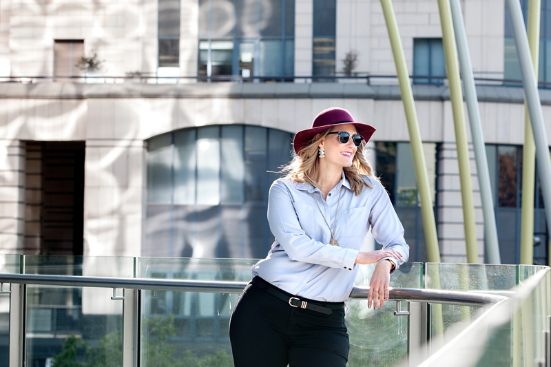 The branded panda wearing a purple hat on the balcony