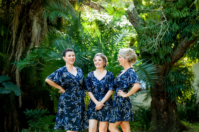 Bridesmaids wearing floral gowns, in tropical setting at the Estuary Hotel, Port Edward.