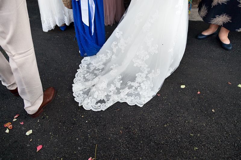 Brides lace detail on dress at wedding at Estuary Hotel, Port Edward.
