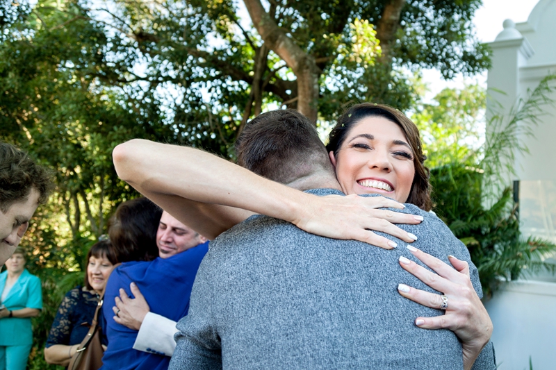 People hugging at wedding at Estuary Hotel, Port Edward.