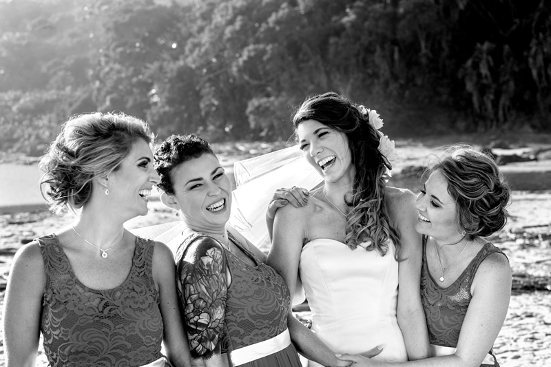 Bridesmaids laughing, on the beach at the Estuary Hotel, Port Edward.