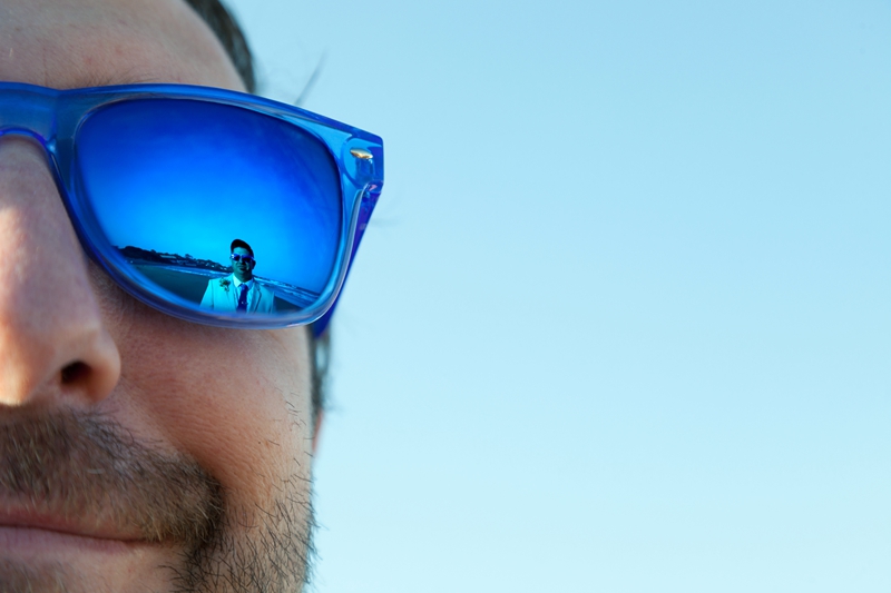 Creative image of groom in groomsman's sunglasses at the Estuary Hotel, Port Edward.