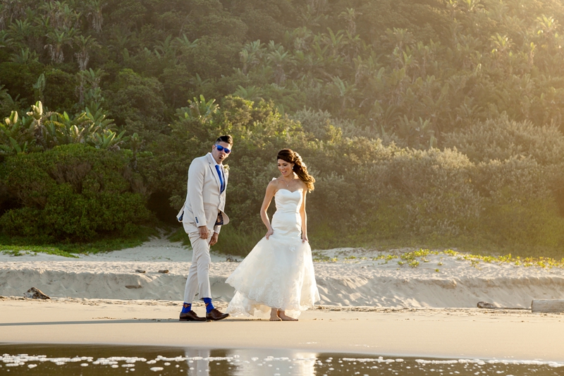 Bride and groom during afternoon light on the beach at the Estuary Hotel, Port Edward.
