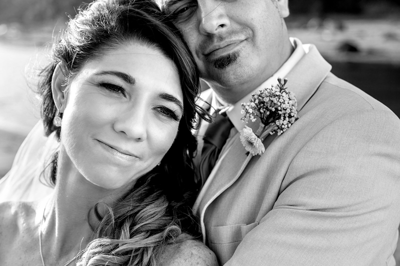 Bride and groom hugging during afternoon light at the Estuary Hotel, Port Edward.