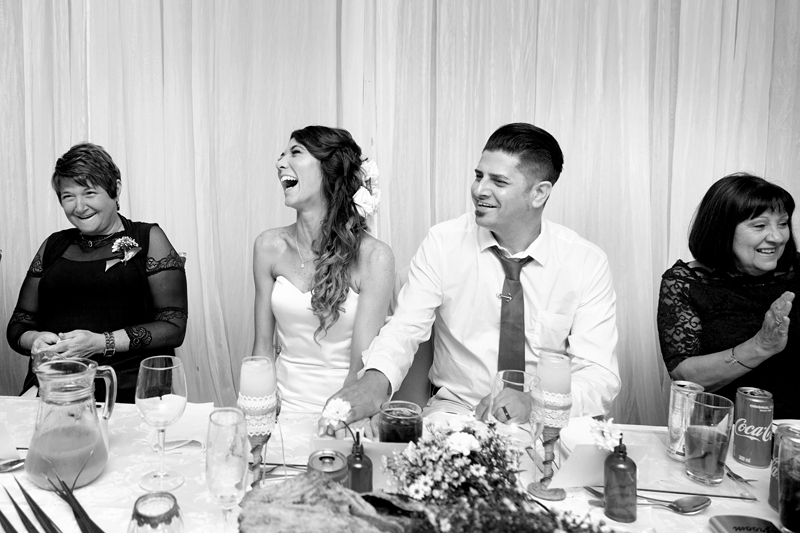 Laughing during speeches at wedding held at the Estuary Hotel, Port Edward