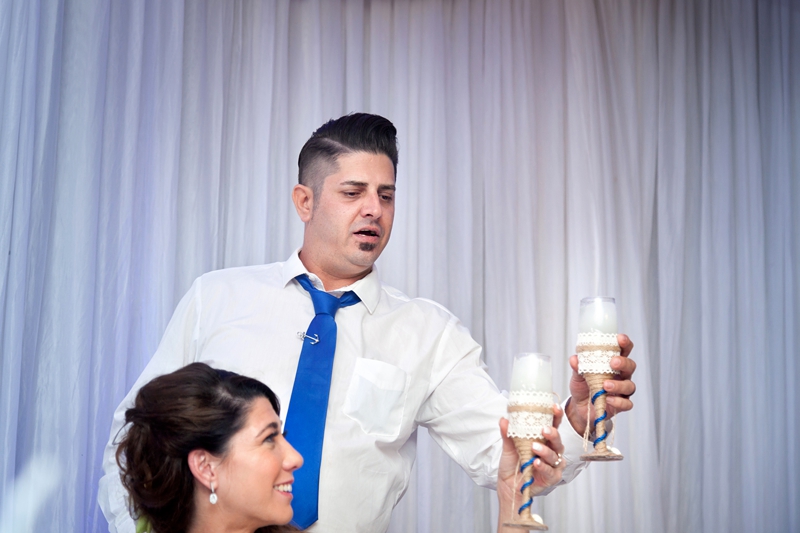 Bride and groom toasting at wedding held at the Estuary Hotel, Port Edward