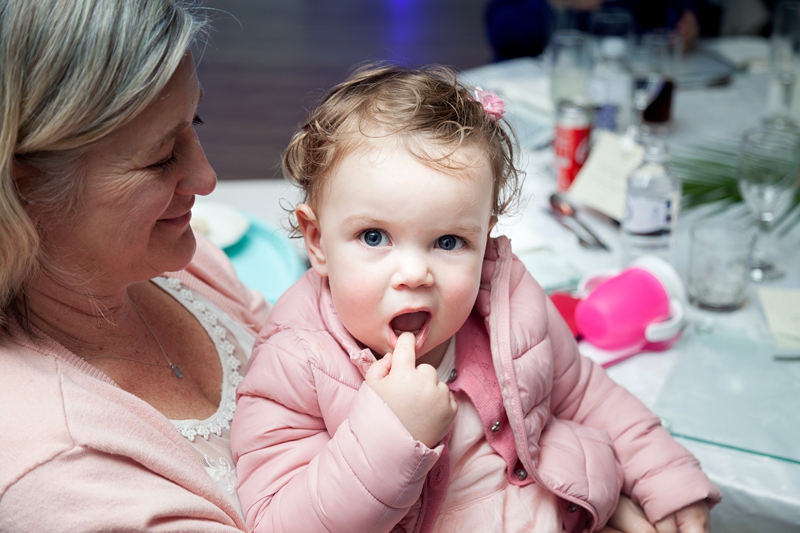 Baby pulling funny face at wedding held at the Estuary Hotel, Port Edward