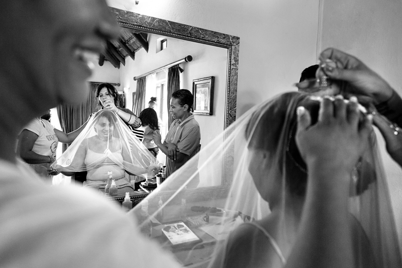 Black and white photograph, Bride with veil reflection at Valverde Eco Hotel.