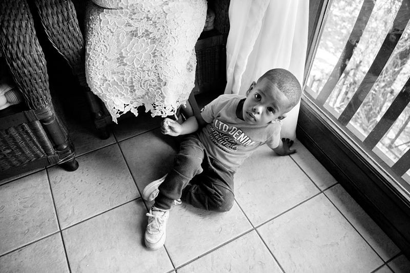 Black and white photograph, child at Valverde Eco Hotel.