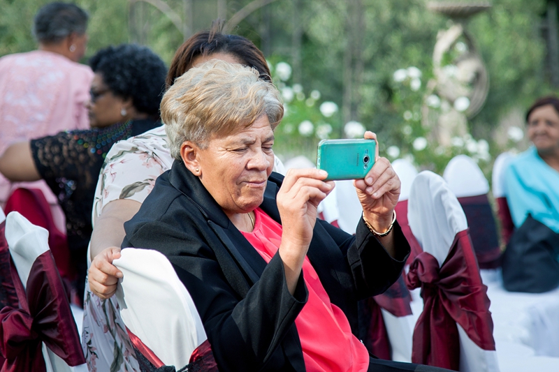 Guests taking photographs during ceremony at Valverde Eco Hotel.