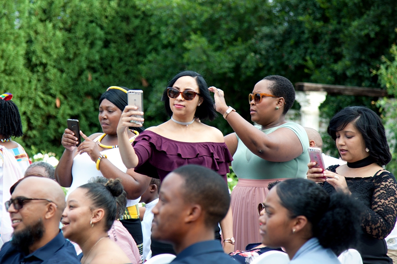Guests taking photographs during ceremony at Valverde Eco Hotel.