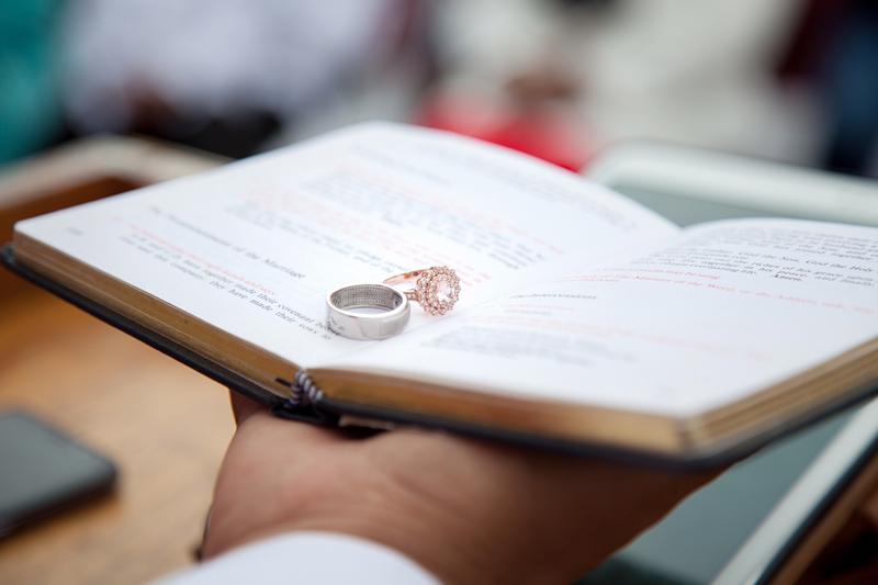 Wedding rings on bible during ceremony at Valverde Eco Hotel.