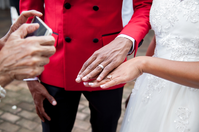 Guest taking photo of bride and groom wedding rings at Valverde Eco Hotel.