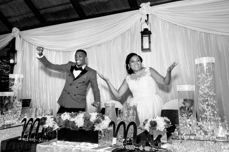 Black and white photograph, groom and bride dancing at Valverde Eco Hotel.