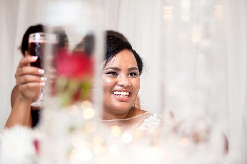 Bride toasting during speeches at Valverde Eco Hotel.