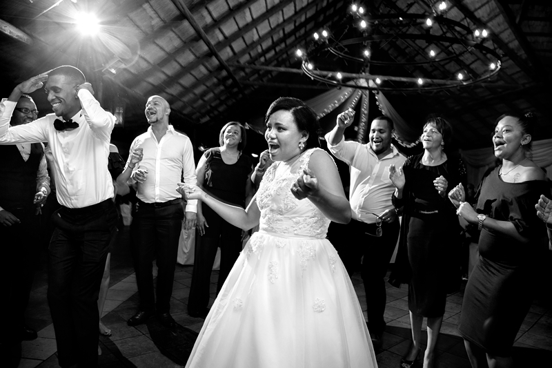 Black and white photograph, bride dancing at Valverde Eco Hotel.