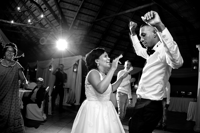 Black and white photograph, bride and groom dancing at Valverde Eco Hotel.
