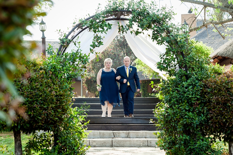 Mom walking groom down the isle at Valverde Eco Hotel.