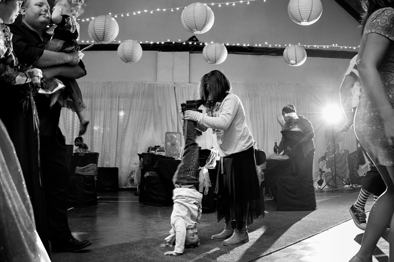 Children dancing at Alice in Wonderland themed wedding.