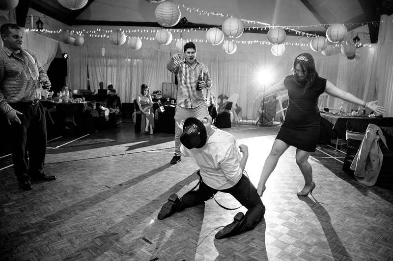 Guests dancing at Alice in Wonderland themed wedding.