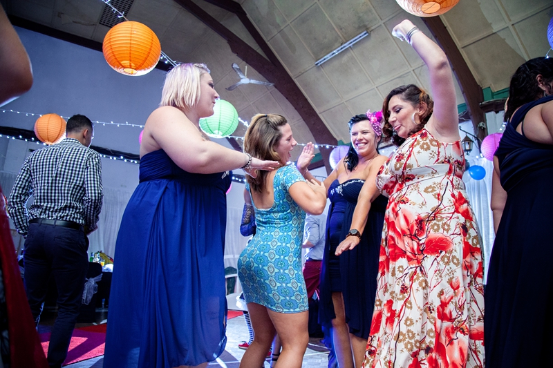 Guests dancing at Alice in Wonderland themed wedding.