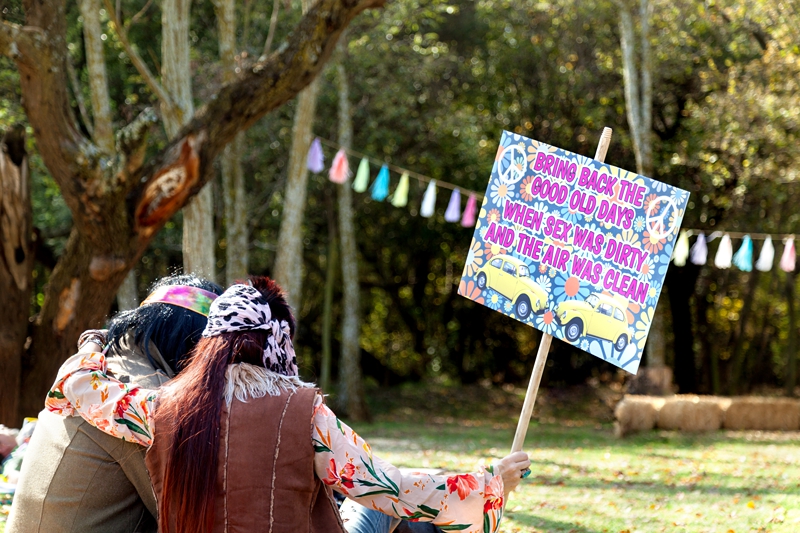 Sign reading,"Bring back the good old days when sex was dirty and the air was clean," during Hippie Fest, at the Forest Venue.