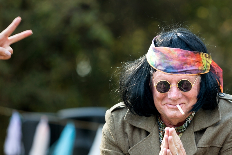 Hippie man with tie dye bandana at Hippie Fest, at the Forest Venue.