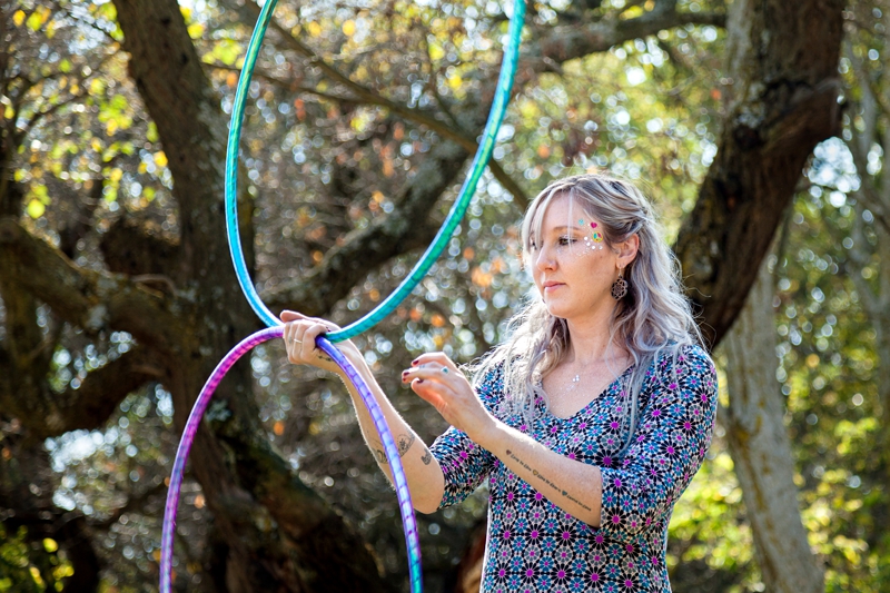 Performing artist from Shantizzles_hoops during Hippie Fest, at the Forest Venue.