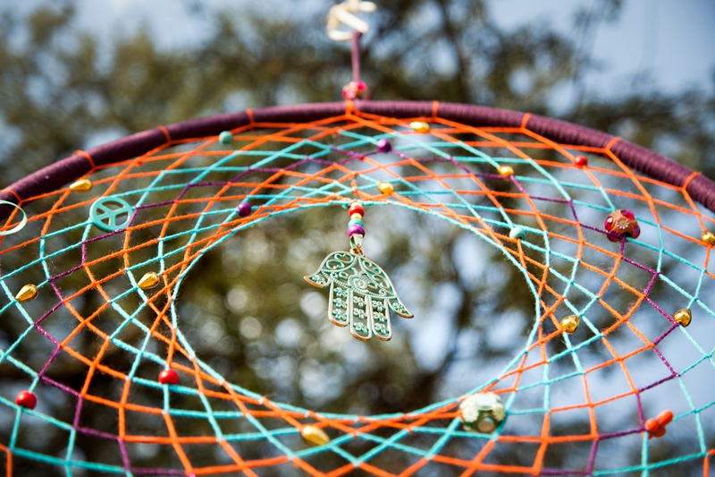 Colourful Hamsa hand dreamcatcher made by GentleTrends Collections, at Hippie Fest, at the Forest Venue.