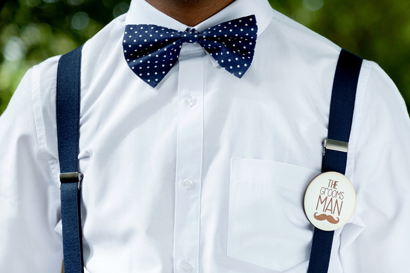 Blue and white polka dot bow tie.