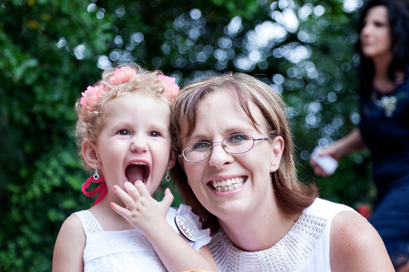 Flower girl pulling funny face.