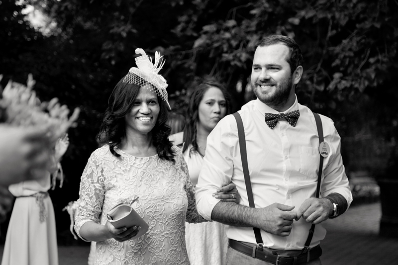 Wedding guest wearing fascinator at Leafy Green Cafe.