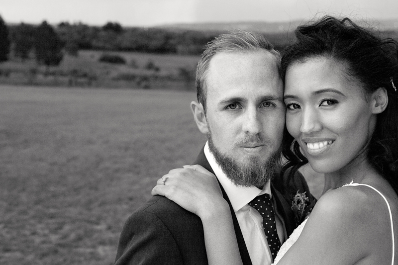 Close up portrait of bride and groom at Leafy Green Cafe.