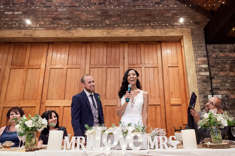 Bride giving speech, during reception at Leafy Green Cafe.