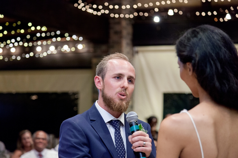 Groom singing to his bride, during the reception at Leafy Green Cafe.