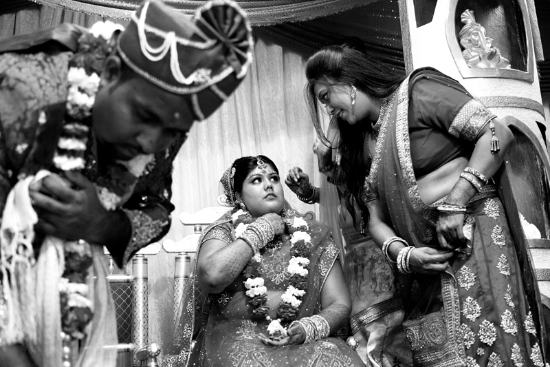 Bride during Hindu ceremony at Shree Radhe Shyam Mandir.