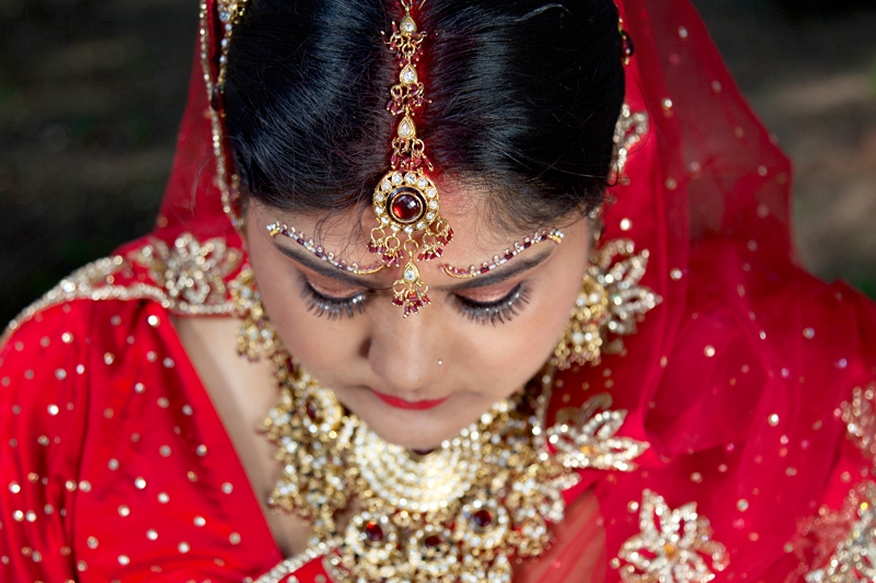 Red and gold traditional Hindu wedding jewelry.