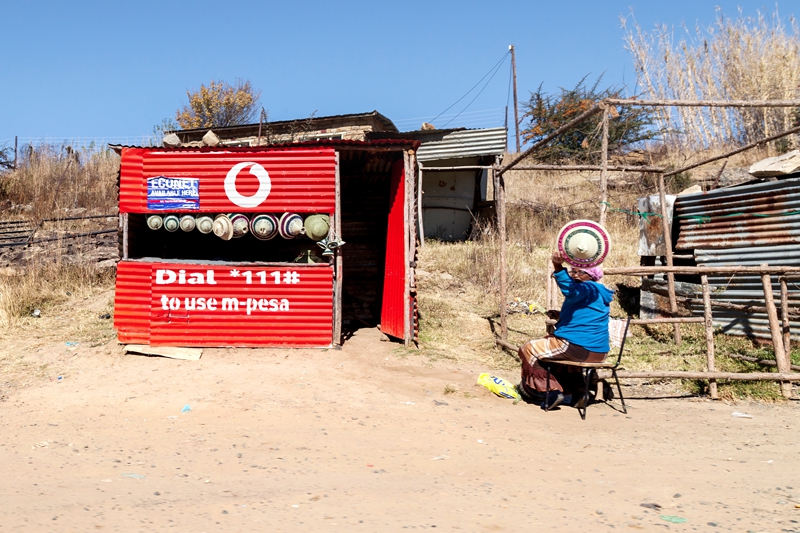 Lady selling traditional Basotho hat in Lesotho.