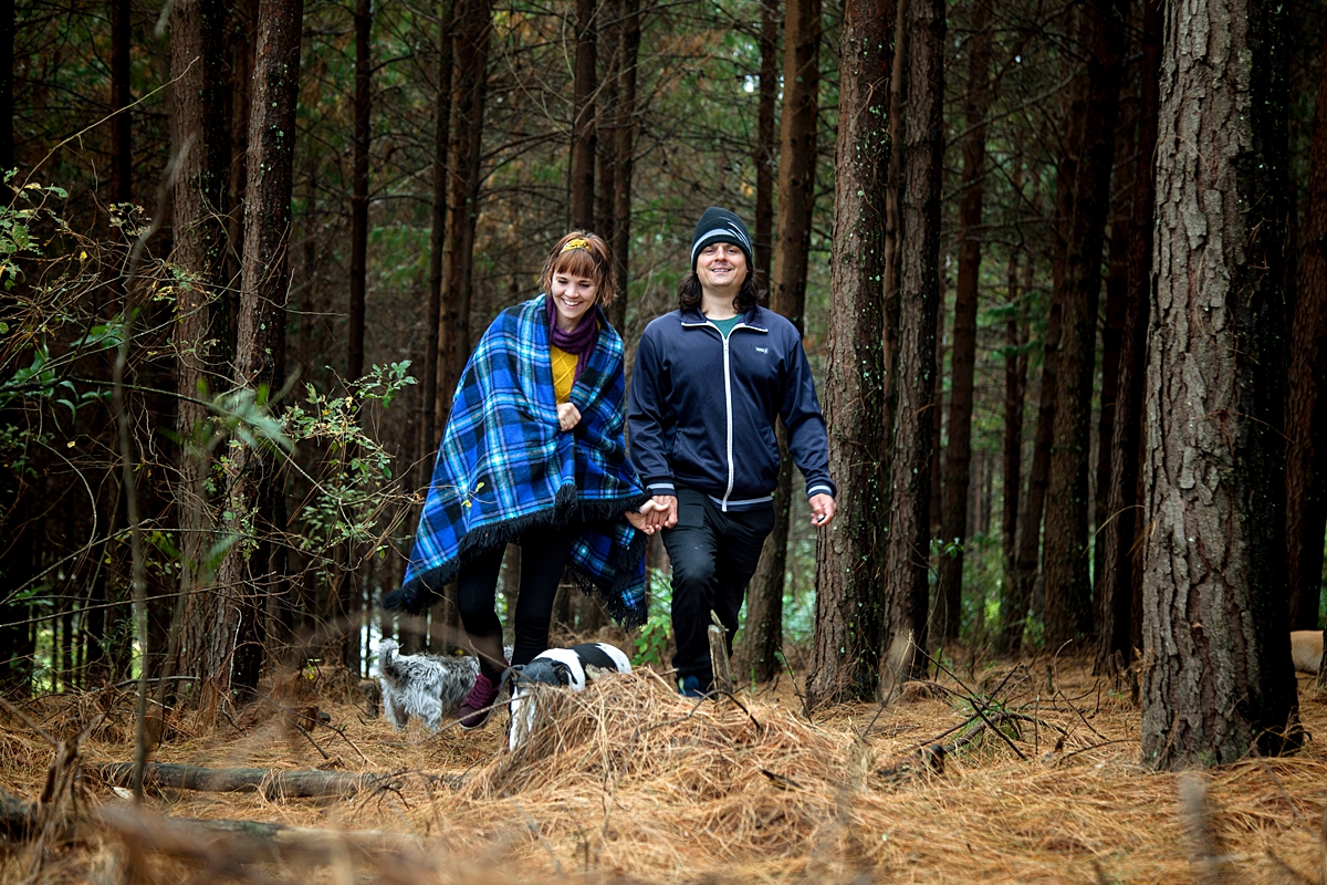 Man and lady walking through the forest in Magoebaskloof